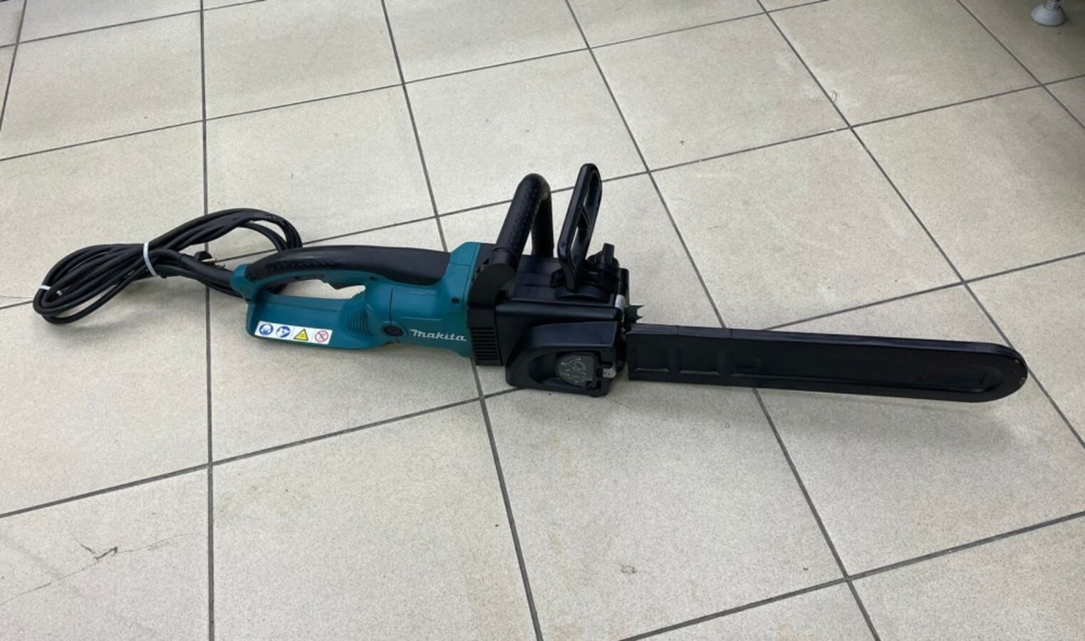 Электро пила Makita UC4030A