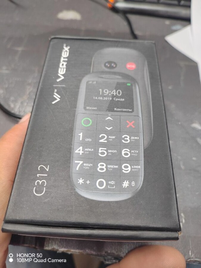 Мобильный телефон Vertex